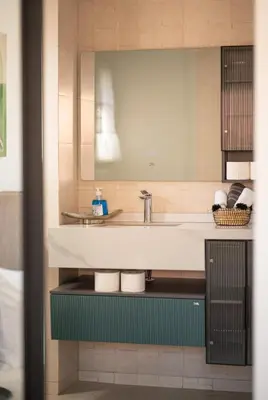 a bathroom with a sink and a mirror at Villa Smahane - Comfort & Private Pool in Marrakech