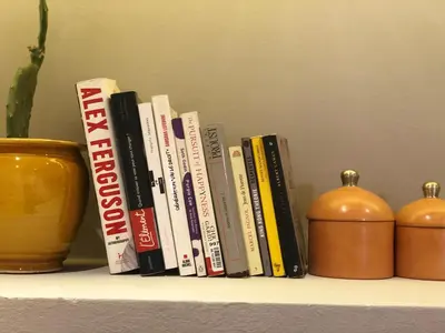 a row of books sitting on a shelf at Du coté de chez Ikram in Marrakech