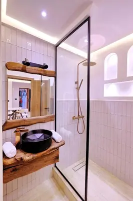 a bathroom with a shower and a sink at Chic & Comfort, Experience Marrakech differently in Marrakech