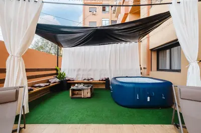 a room with a tent and a hot tub at 4BR Duplex - Jacuzzi - 10 min walk to M Avenue with Parking and Pool in Marrakech