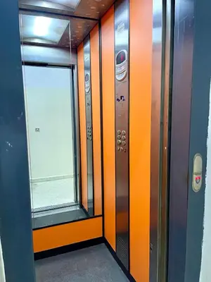 an elevator in a train with a window at Wonderful & Warm in City Center in Oulad Akkou