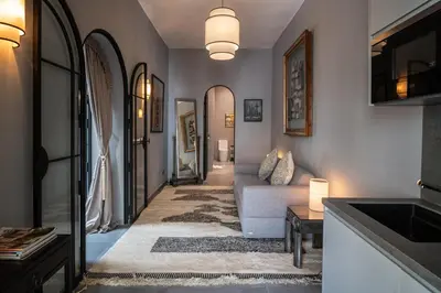 a hallway with a living room with a couch at Dar Mo'Da in Marrakech