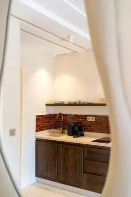 a kitchen with a sink and a counter top at Excellent apartment plus hot tub in Marrakech