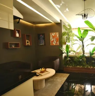 a living room with a couch and a table at Luxurious apartment with private jacuzzi in Marrakech