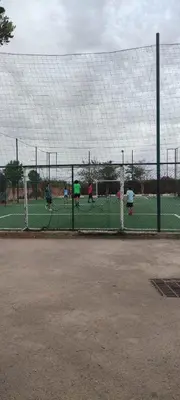 a group of people playing soccer on a field at Atlas Golf Resort - Marrakech palmeraie a 6 k m du centre in El Mgassem