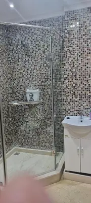 a bathroom with a shower and a sink at Apartment Majdoline in Marrakech