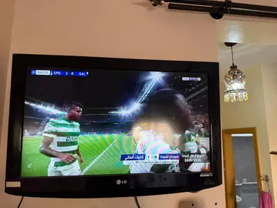 a flat screen tv with a soccer game on it at Apparemment à Marrakech in Marrakech