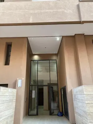 an office building with a glass door in front at Studio Jasmine in Marrakech