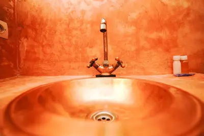 a sink in a bathroom with a faucet at Dar JOMANA in Marrakech