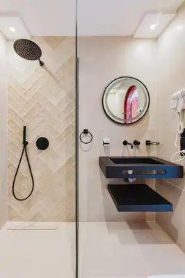 a bathroom with a sink and a shower at Maison Joudia in Marrakech