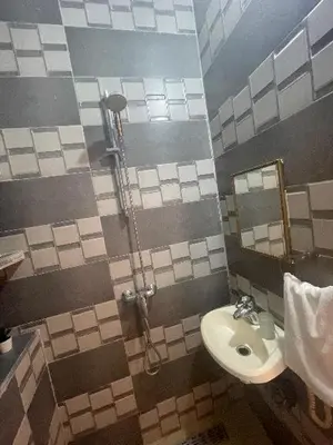 a bathroom with a sink and a toilet at Dar darkoum in Marrakech