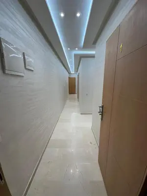 a hallway with a door and a wall with a ceiling at Karam eddin in Marrakech