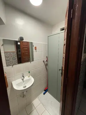 a bathroom with a sink and a mirror at Riad Serenity Palmeraie in Marrakech