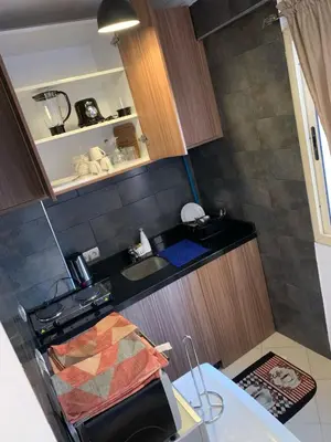 a small kitchen with a sink and a counter at Studio Stay Marrakech in Marrakech
