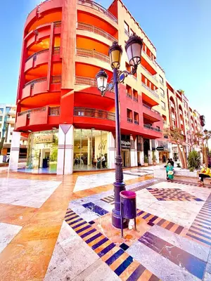 a street light in front of a building at Appartement Plaza Centre in Marrakech