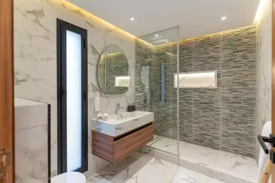 a bathroom with a sink and a shower at Villa Lana on stilts luxury and relaxation in Marrakech