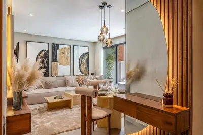 a living room with a couch and a table at L'Amira - Super Apartment with Terrace - 2 people - Wifi in Marrakech