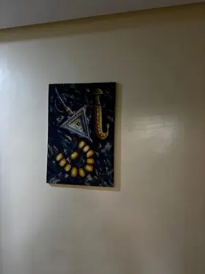 a picture of a painting on a wall at Dar Kawtar in Marrakech