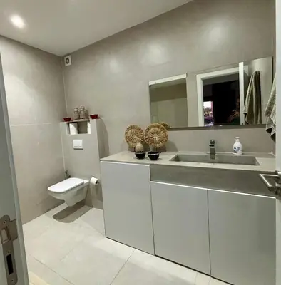 a bathroom with a sink and a toilet at Luxury apartment with swimming pool, Hivernage in Marrakech