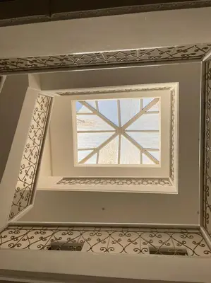 a window in the ceiling of a room at Riad-style triplex in secure residence in Marrakech