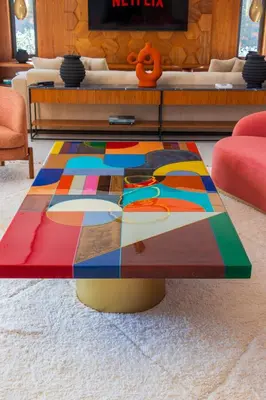 a colorful coffee table in a living room at Villa Jamila Marrakech in Segraga