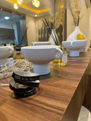 a counter with a bowl and a toilet on it at Duplex chic et lumineux avec piscine proche centre in Marrakech