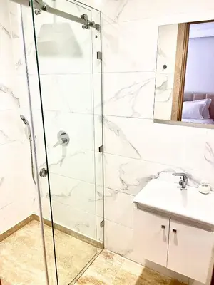 a bathroom with a shower and a sink at Gueliz Harmony in Marrakech