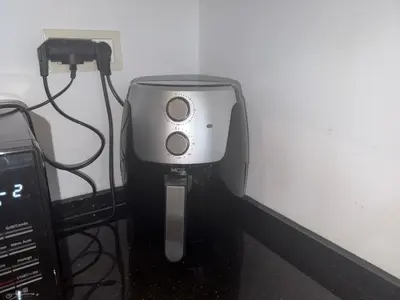 a small appliance is plugged into a wall at Charmant appartement avec terrasse au cœur de Marrakech in Marrakech
