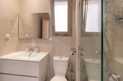 a bathroom with a toilet and a sink and a shower at Marrakech prestigia in Marrakech