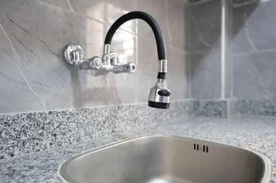 a kitchen sink with a faucet on a counter at Comfort and Simplicity in Marrakech in Marrakech