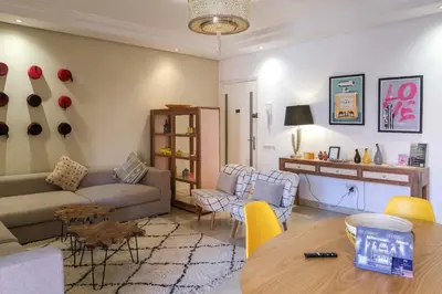 a living room with a couch and a table at 