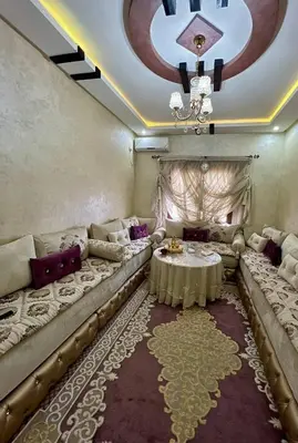 a living room with a couch and a table at Appartement Jamaa El Fna View in Marrakech