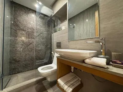a bathroom with a sink and a toilet and a shower at Chic 2BDR Apartment in Gueliz in Marrakech