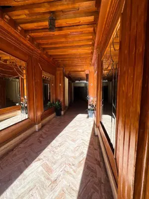 an empty hallway of a building with wooden walls at Studio Rolex Guéliz, situé à seulement 5 minutes de la place Jemaa El-Fna in Marrakech