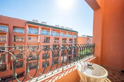 a balcony with a view of a building at Luxury 2 BDRM in Hivernage with Pool and Garden in Marrakech
