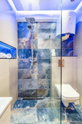 a bathroom with a shower and a toilet at Cocon de Guéliz - Central & balcon in Marrakech