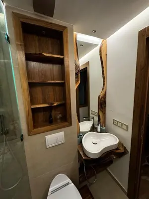 a bathroom with two toilets and a sink at Super duplexe en plein Marrakech in Marrakech
