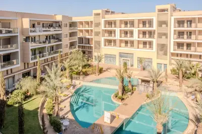 an aerial view of an apartment complex with a swimming pool at Marrakech apartment with pool - Pearl Garden in Marrakech