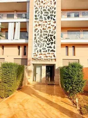 an external view of a building at Marrakech apartment with pool - Pearl Garden in Marrakech