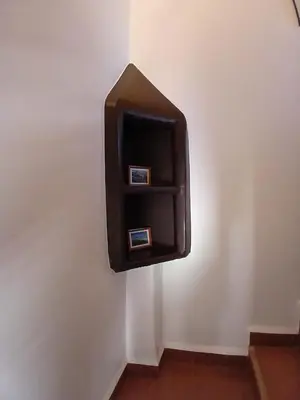 a soap dispenser on the side of a wall at La casa de alma in Aït Hamid