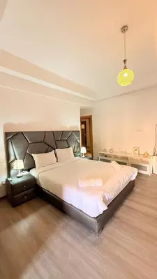 a bedroom with a large bed in a room at Chic Stay in Gueliz 1 in Marrakech