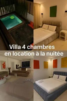 a living room with two beds and a swimming pool at Villa Wissam in Marrakech