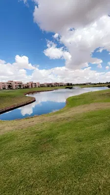 a view of a pond on a golf course at Luxury Prestigia Golf City jade in Marrakech