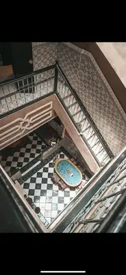an overhead view of a staircase with a swimming pool at chambres Marrakech in Marrakech