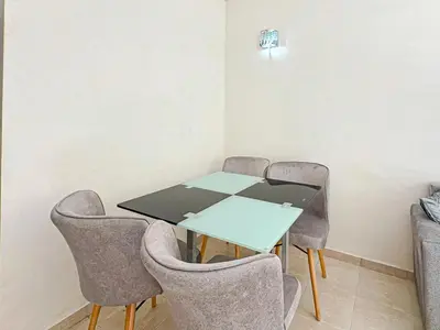a meeting room with a table and chairs at Elegance and comfort in Marrakech Top Location in Marrakech