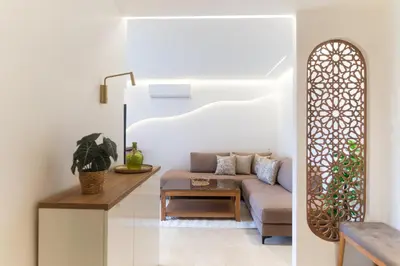 a living room with a couch and a table at AyaMi Marrakech Luxury Stay in Marrakech