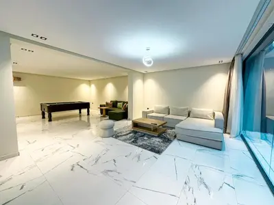 a living room with a couch and a piano at Villa CAN 2025 & Chill Marrakech in Dar Caïd Layadi