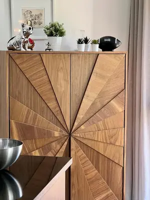 a wooden cabinet with a wooden door in a kitchen at Prestigia Agate 5 minute from Airport in Marrakech
