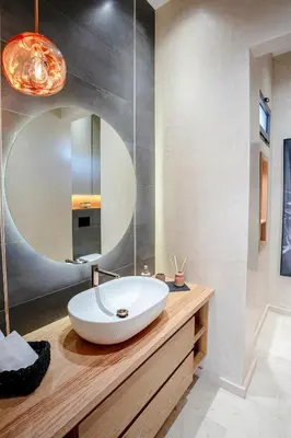 a bathroom with a white sink and a mirror at Villa Nerolia - Marrakech in Marrakech