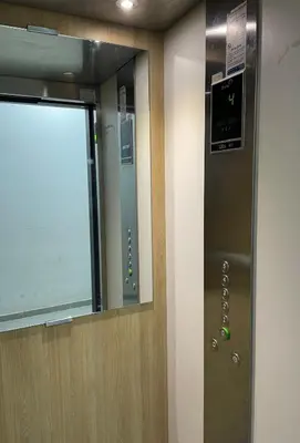 a elevator in a room with a mirror at Modern and quit appartment in Marrakech